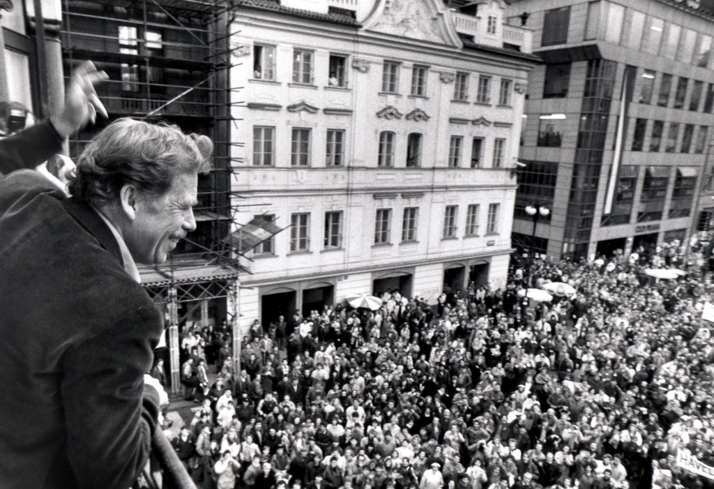 Image: File photo of presidential candidate Havel waving to his supporters from a balcony in Prague